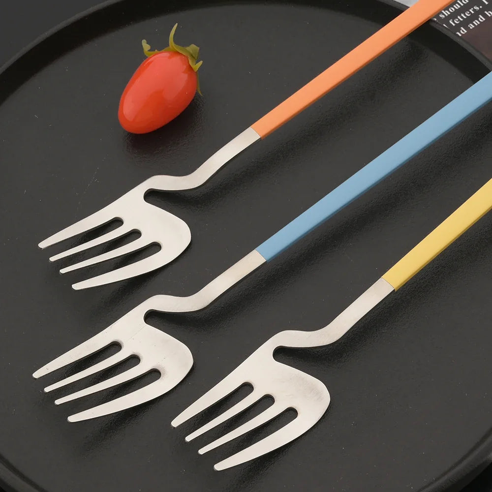 Surreale Edelstahl-Flatware 16-teiliges Set mit bunten Griffen