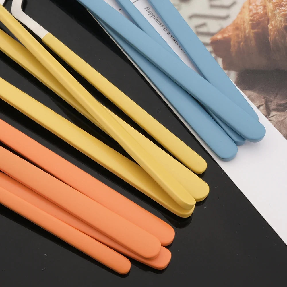 Surreale Edelstahl-Flatware 16-teiliges Set mit bunten Griffen